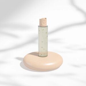 Clear cosmetic plastic bottle with wooden disk top flip cap mockup, flat disk cap round packaging, modern skincare container, cylindrical shape squeeze bottle, cylinder liquid shompoo bottle